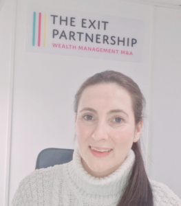 Headshot of Victoria Hicks wearing a white jumper and sitting under logo for The Exit Partnership